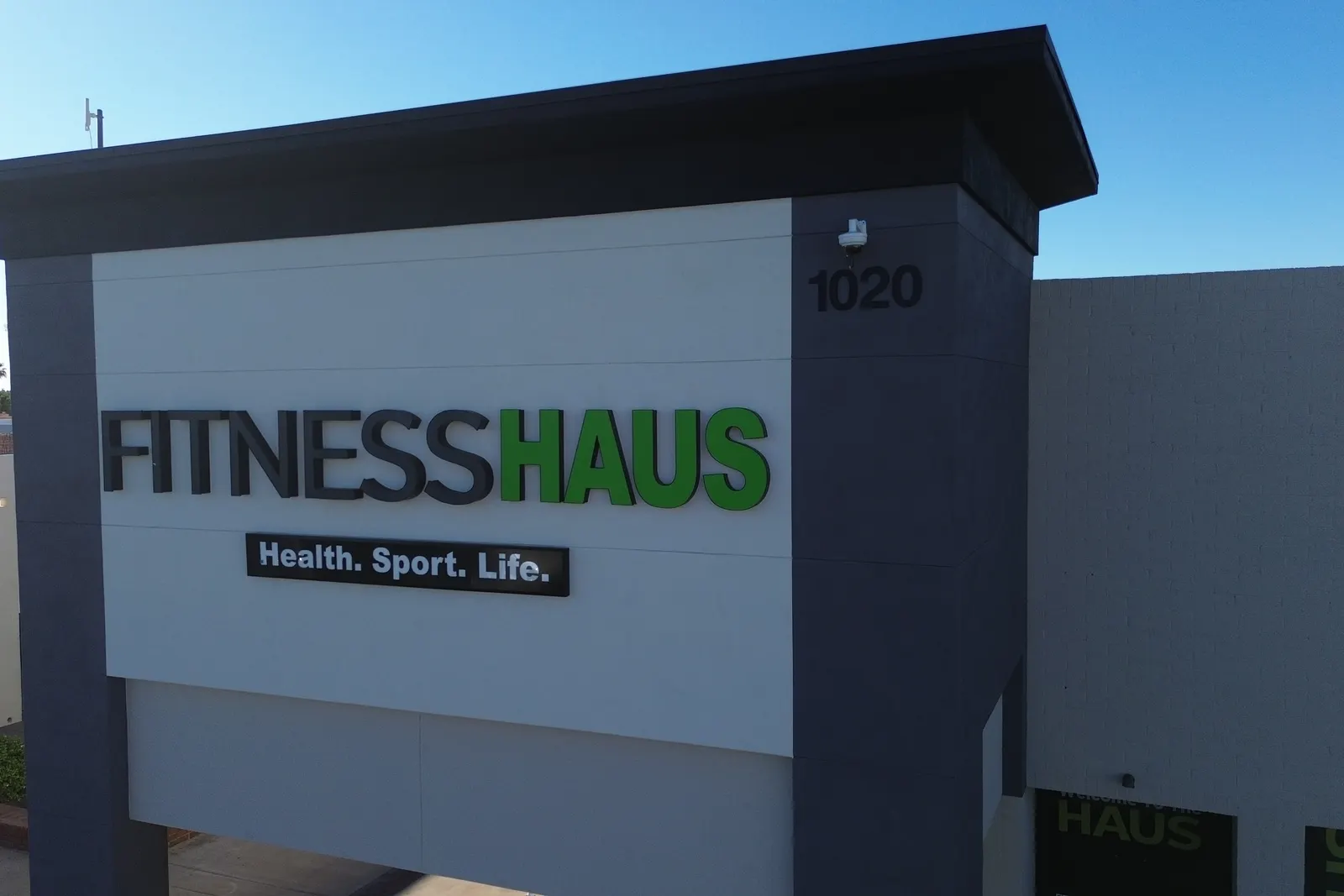The front of Fitness Haus at 1020 West Southern Avenue, with the green and black sign above the entrance.